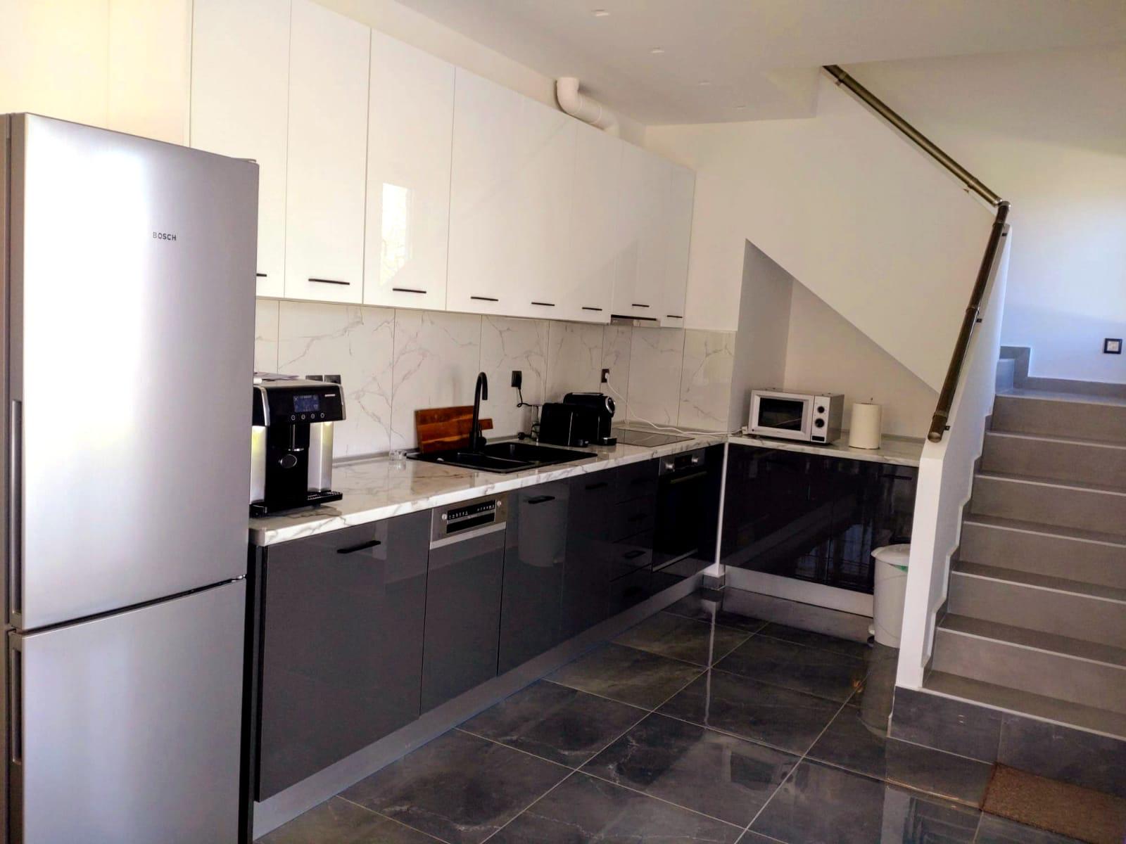 Bright and modern bedroom in the Andrijana Luxury Houses villa